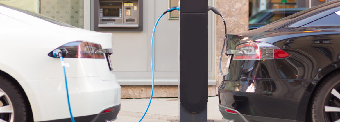 Electric Cars in Charging Station.