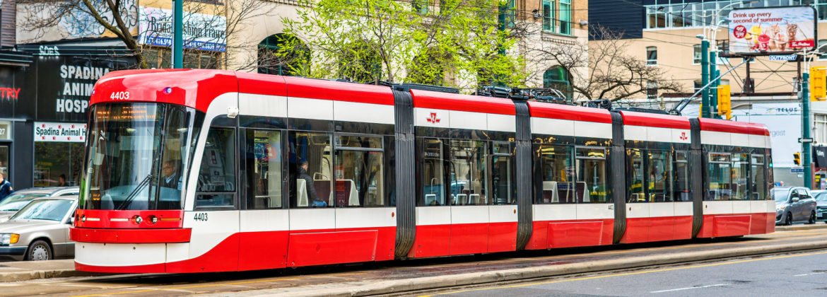 Modern streetcar on a street of Toronto